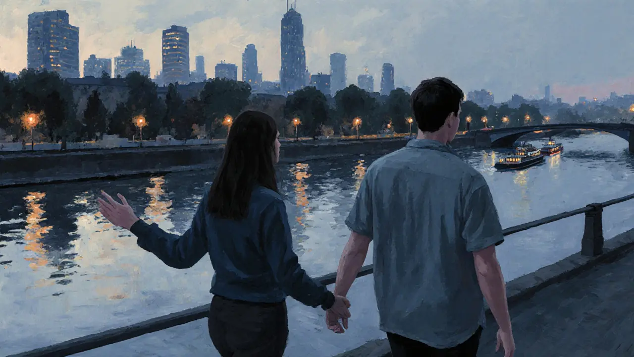 Couple walking peacefully along the Spree River at twilight, city reflections in the water.