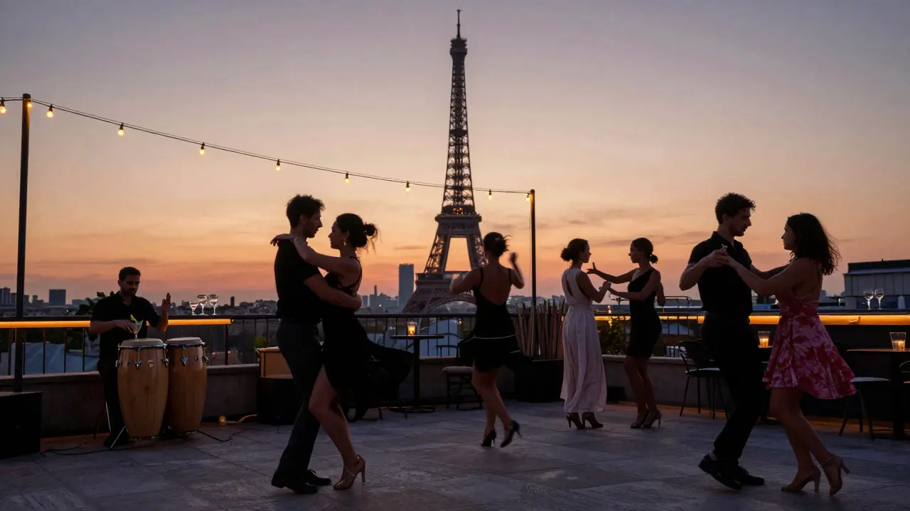 Couples dancing on a rooftop terrace in Paris at sunset with the Eiffel Tower in the background.